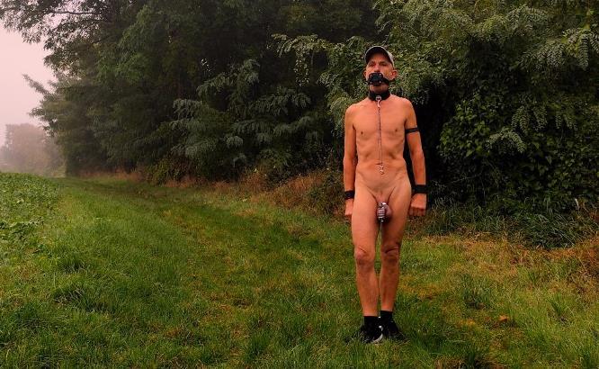 naked slave pig exposed outdoor hiking in penis cage