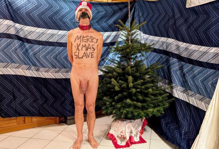 naked pathetic christmas slave decorate the tree