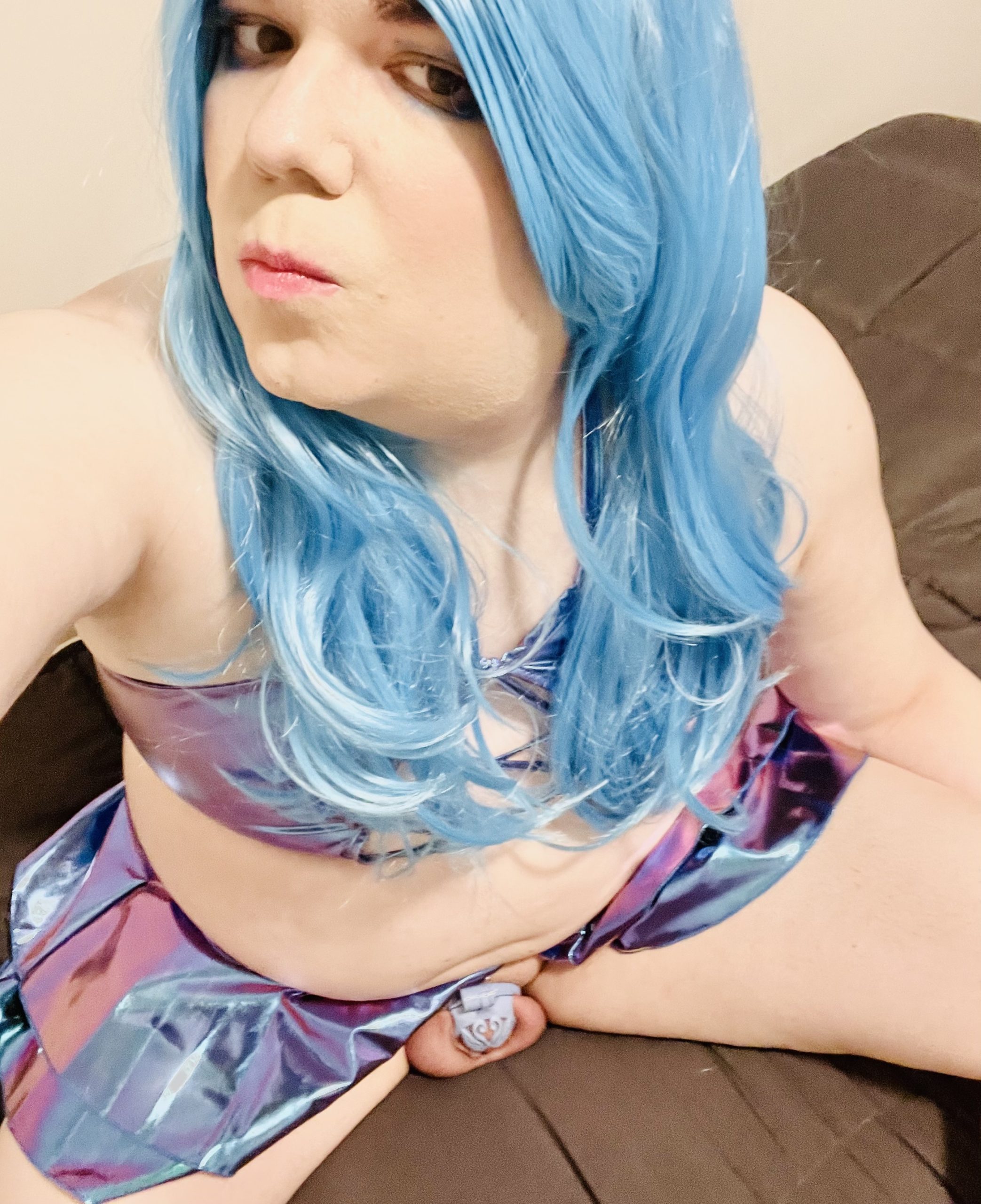 Donna the sissy sl*t – she loves her metallic blue mini skirt