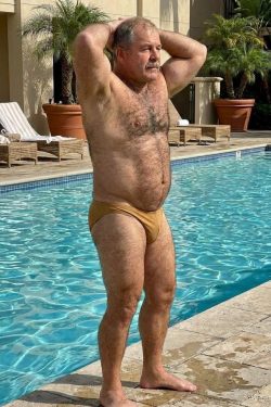 Mature sub posing by pool